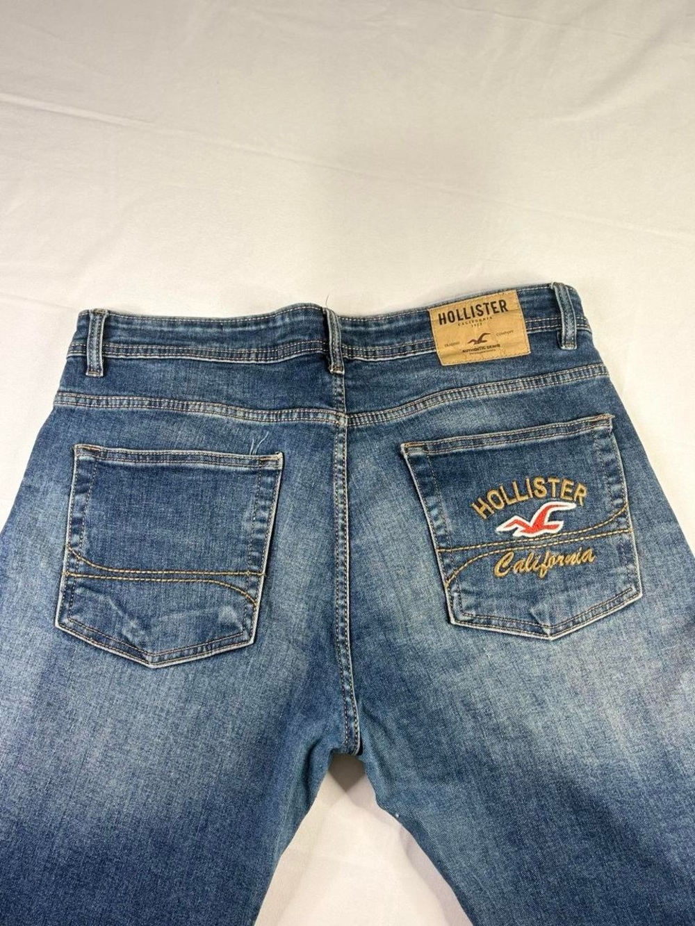 Y2K 2000s style Embroidered Hollister Baggy Stained Jeans | $38.99